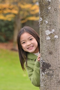 Little Chinese girl posed for a photo shoot